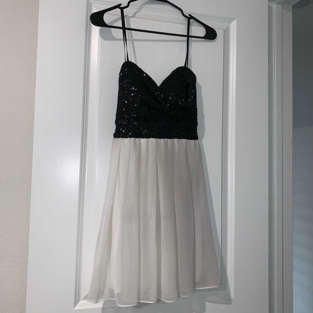 B.Smart black sequin and white dress, size 3